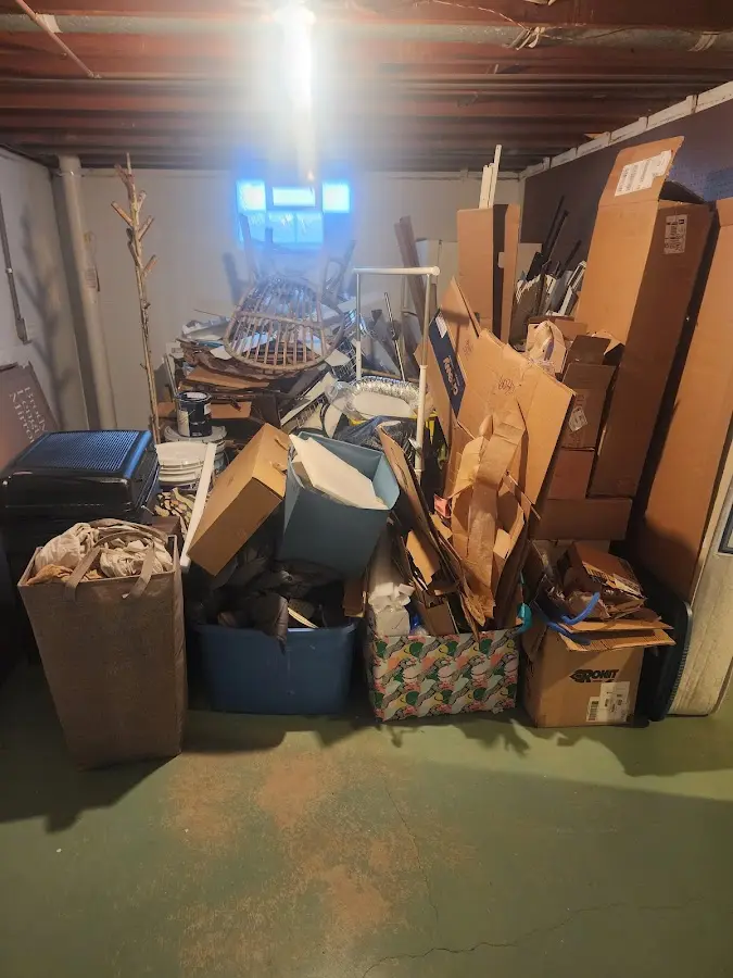 Roll-off dumpster container at job site for 4 Yard Dumpster Rental in Grandville